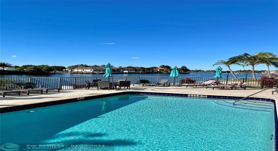 Watch the yachts go by while lounging by the pool