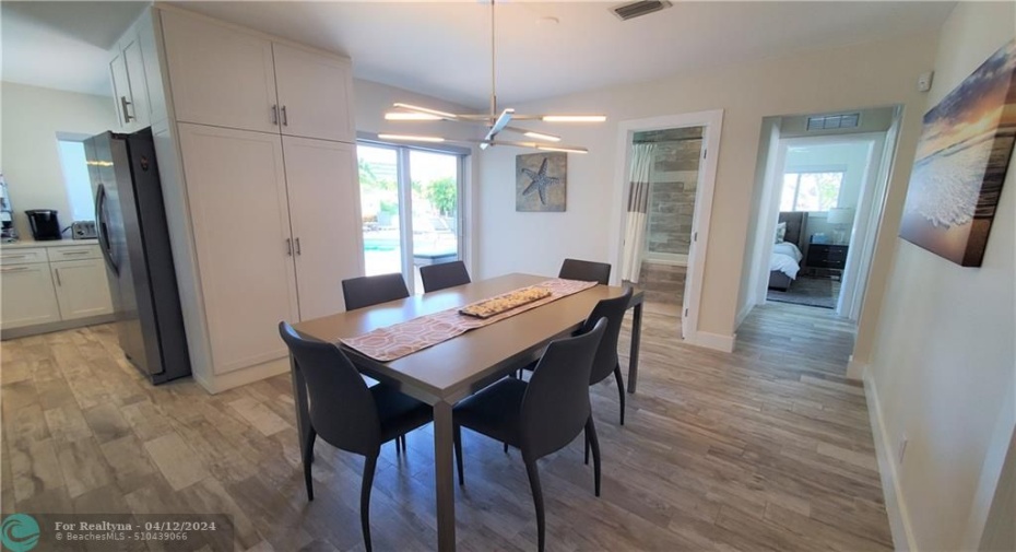 dining area looks out to pool