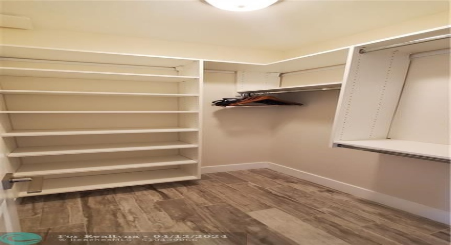 2 walk in closets in master