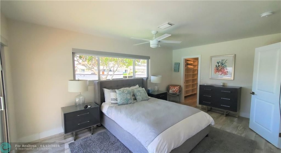Guest Bedroom has lots of light and a walk in closet