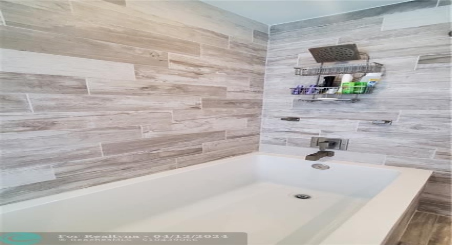 deep soaking tub and rain head type shower