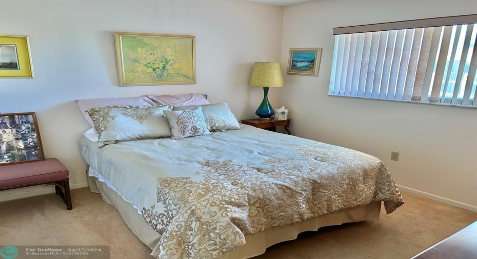 GUEST BEDROOM IS ALSO BRIGHT & JUST STEPS FROM THE 2ND BATHROOM.