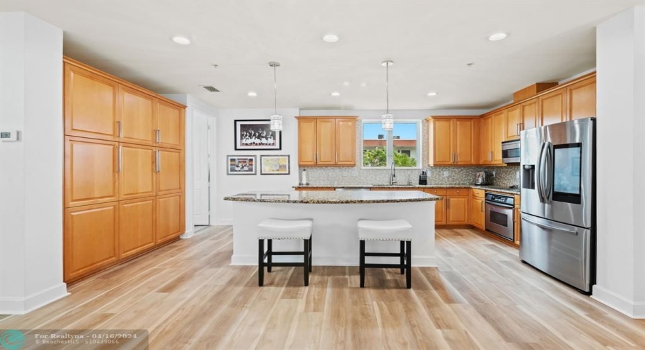 Amazing large kitchen. Laundry room off kitchen area.