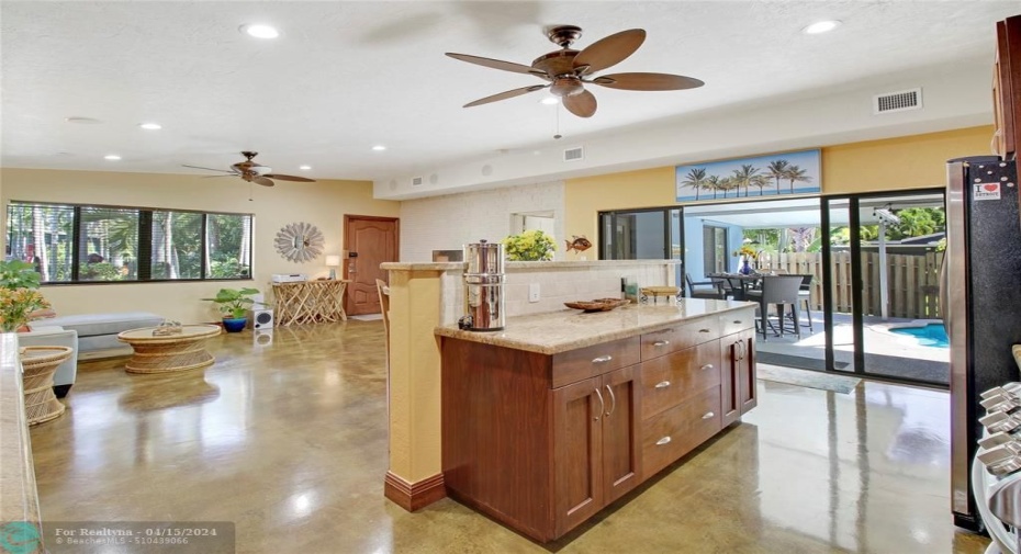 Full view from entry to pool area. Home has wonderful vibe for entertaining and brigh tropical views.