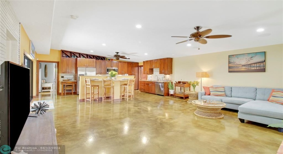 Open family style living with beautful rich toned stained concrete floors, which do not show in these photos. Must be seen to appreciate the beauty and style.