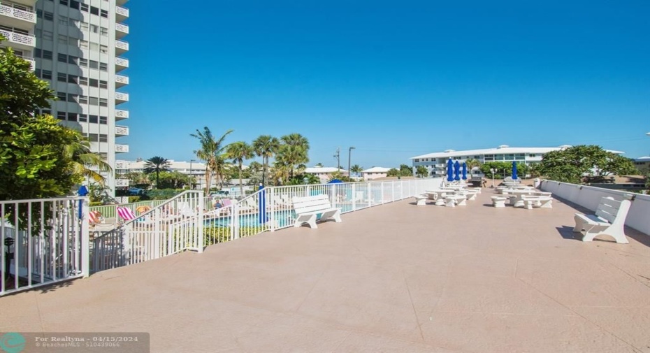 Spacious pool deck with lots of room for entertaining and grilling.