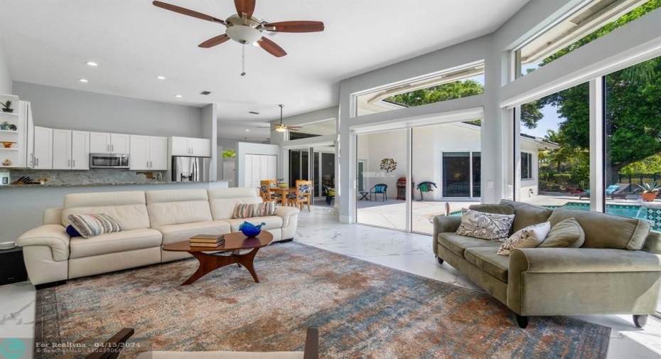 Warm and welcoming family room abuts kitchen and tranquil patio views!