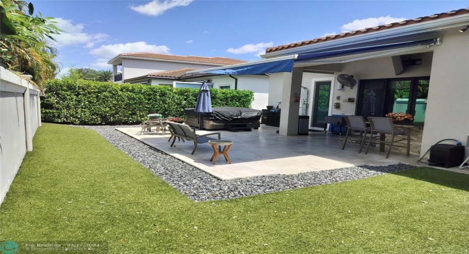 Back Patio Area with Electric retractable Awning - pavers extended