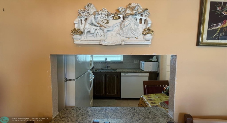 Looking into the kitchen from the dining area