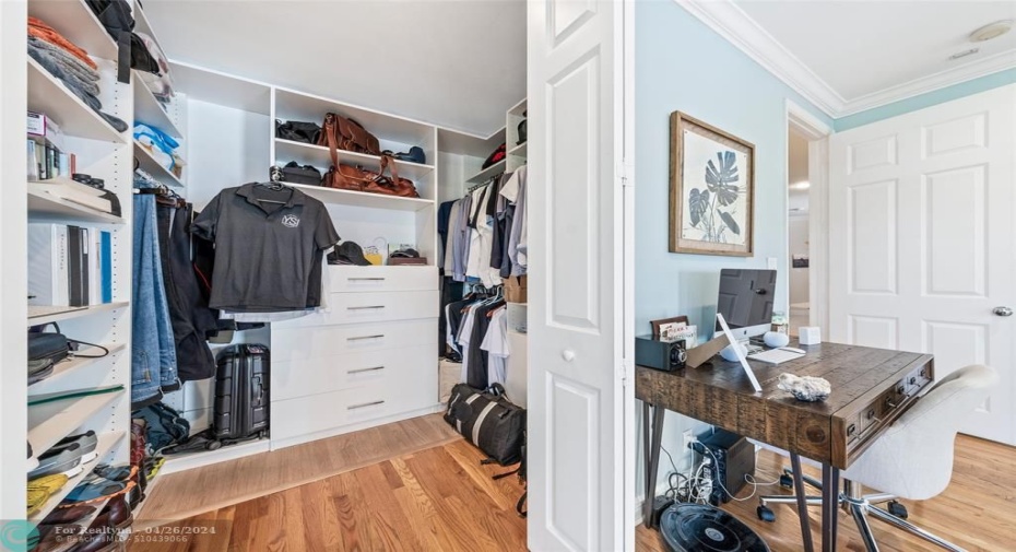 2 of 2 Walk In Closets in Primary Bedroom
