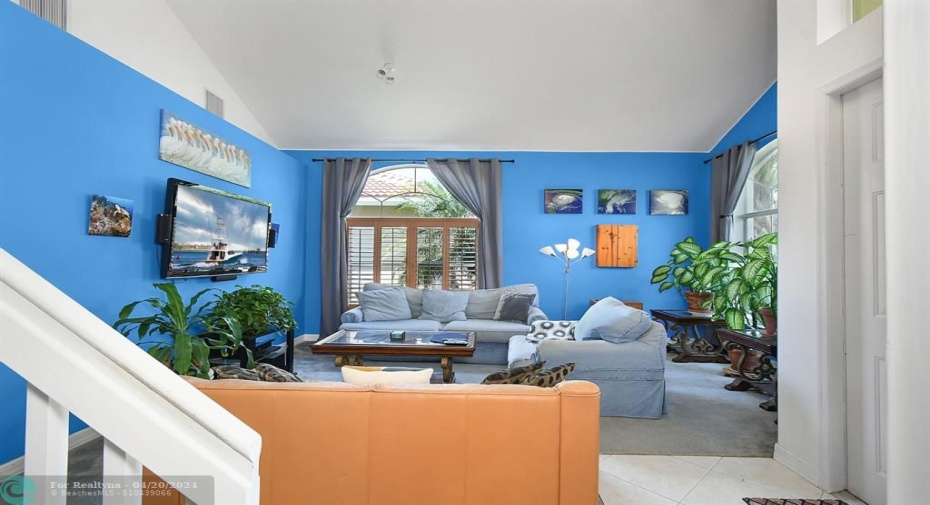 PLANTATION SHUTTERS ON SEVERAL WINDOWS.