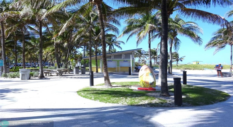 food stand next to park on the beach.