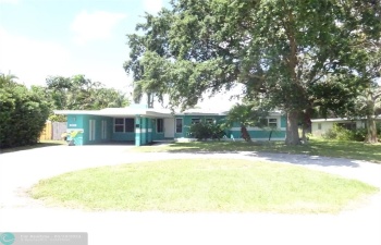 Carport and circular driveway