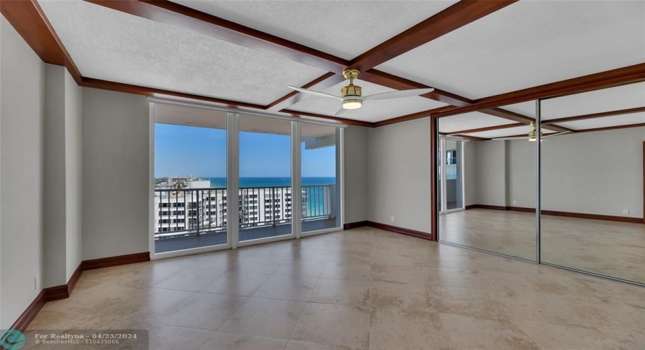 4th bedroom. Porcelain flooring, mirrored custom closet, and beautiful ocean view