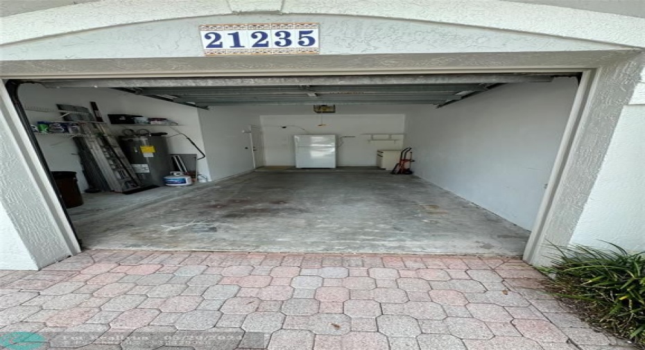 1 car garage with outdoor refriderator