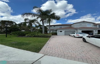 Property is the end unit with front door entrance to the left side of the property