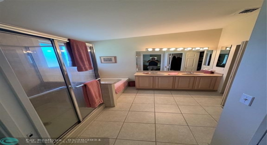 Large shower, separate tub, double sink