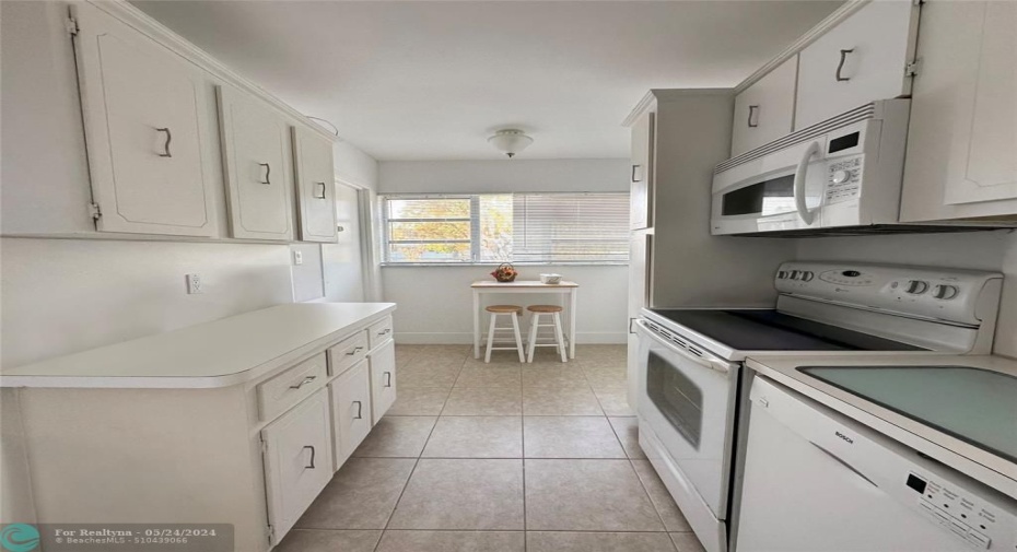 Kitchen has 2 windows which filter an abundance of natural light !