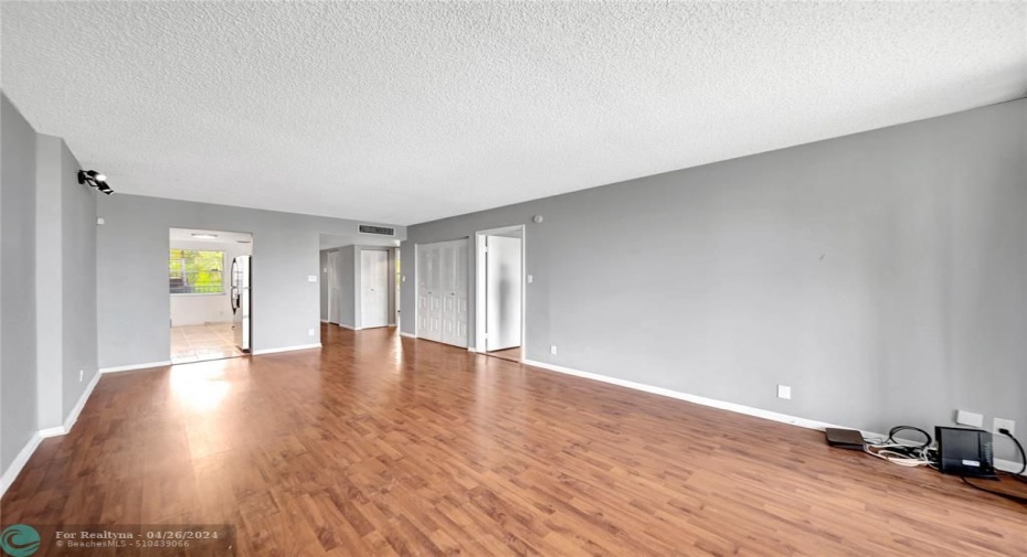 Living Room/Dining Room with Entry To Kitchen & Master Bedroom