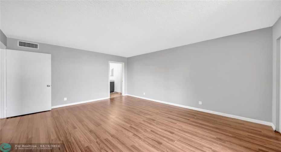 Master Bedroom and Entry to Master Bathroom