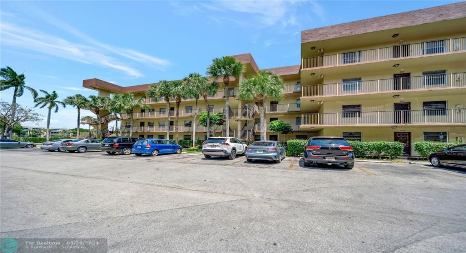 Unit in Building with Large Parking Lot