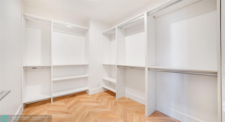Walk in closet in hallway to 2nd bedroom.