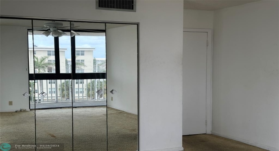 with closet and Hurricane window
