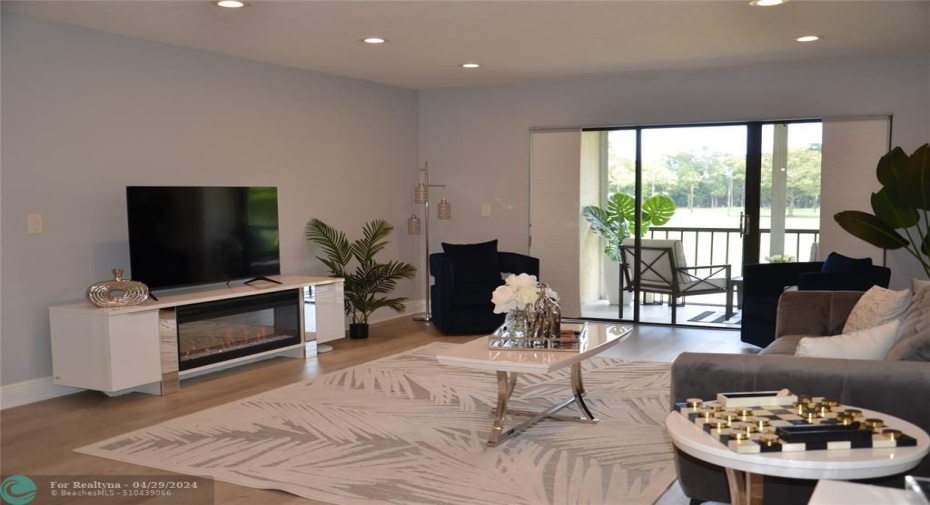 Nwly furnished-T with serene electric fireplace.