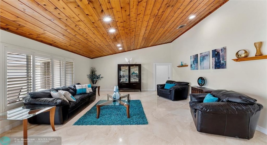 GLASS DOOR LEADS TO 4 BEDROOMS/BATHROOMS