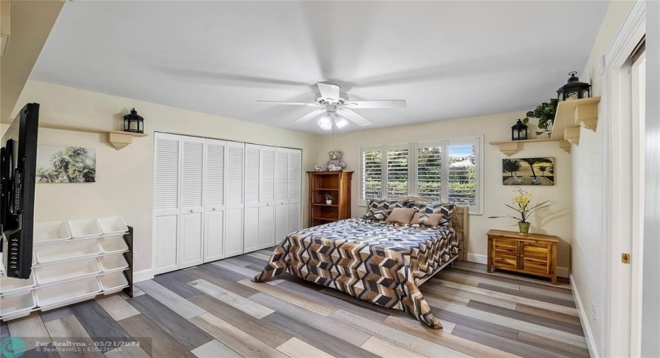 BEDROOM WITH NEW FLOORING  CLOSETS HAVE BUILT INS -BATHROOM CONNECTED
