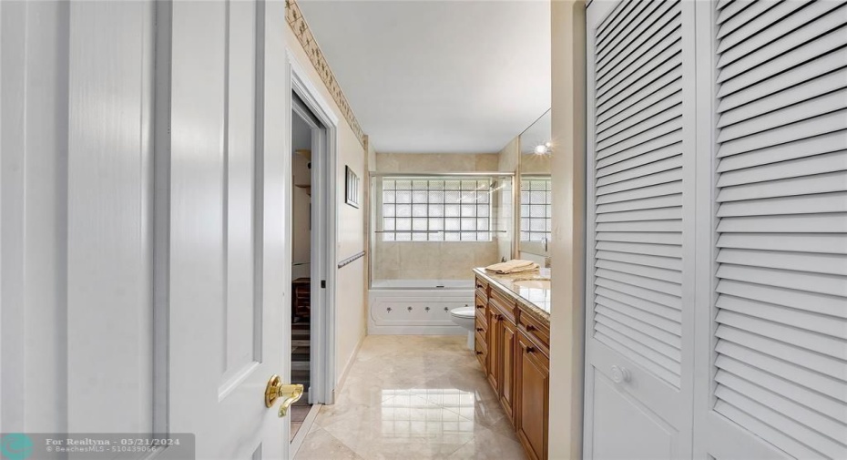 FULL BATH WITH SPA TUB-LINEN CLOSET-CONNECTED TO BEDROOM AND HALL ENTRANCE