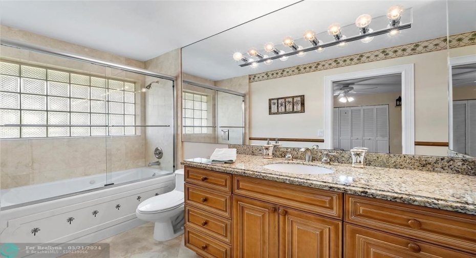 HIGH CABINETS WITH MARBLE BEVELED COUNTERS