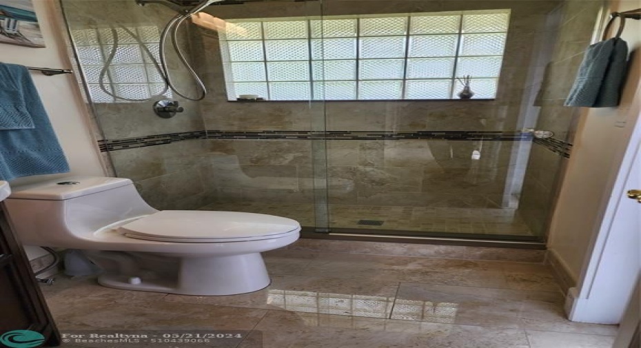 TOTALLY NEW-TOILET, SINK CABINET-SHOWER,FLOORS AND WALLS.