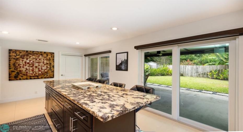 kitchen island with the wonderful work area with doors to the patio can you say PARTY Time