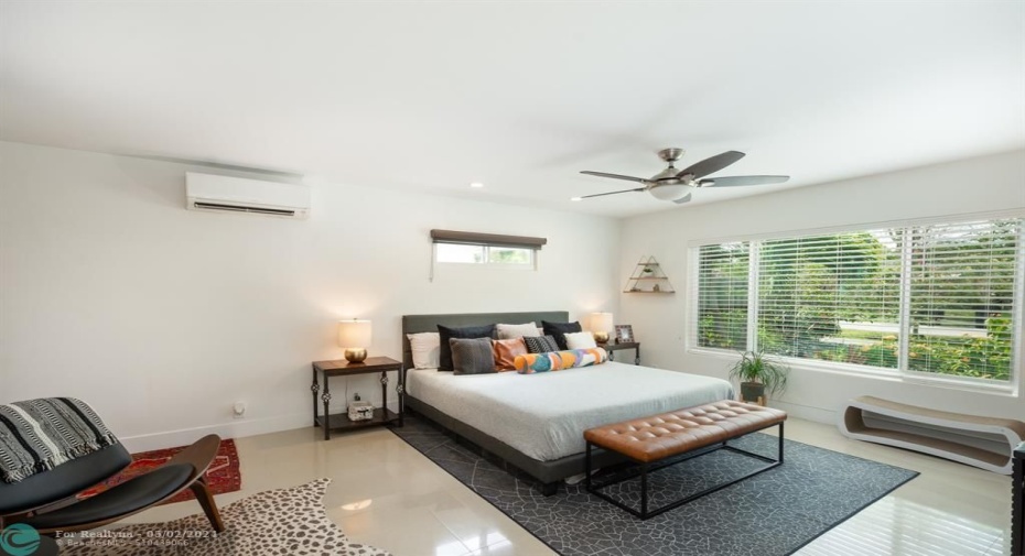 owner's bedroom with ensuite bathroom loads of natural light and features a walk in closet.