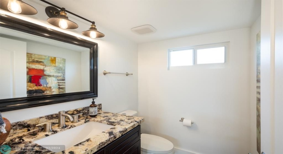 light & bright half bathroom.