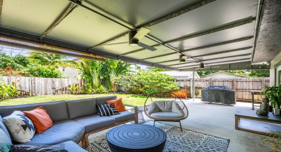 fully fenced yard with access to the rear alley great for garden projects or construction of a pool