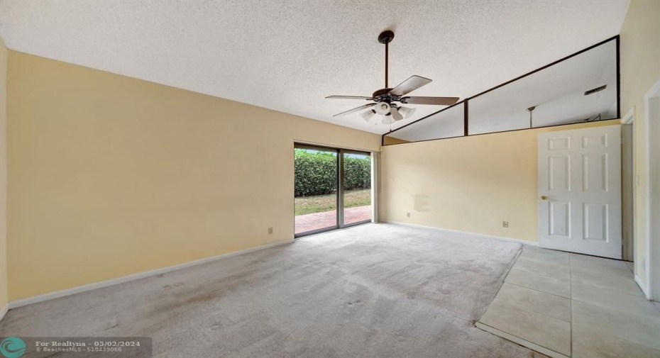 Main bedroom has impact sliders to the backyard