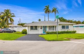 Oversized corner lot with income producing detached studio in back of house.