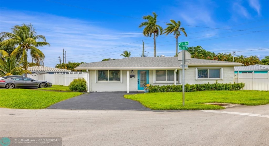 Oversized corner lot with income producing detached studio in back of house.