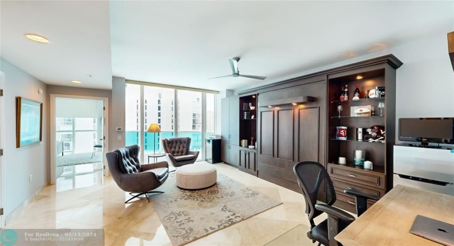 Den with Murphy Bed and full bathroom