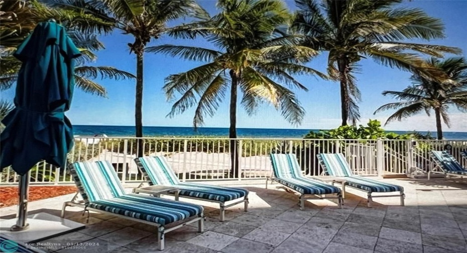 Private pool with direct beach access and buildig provided chairs and umbrellas for use on the beach