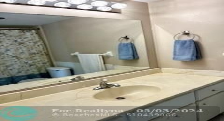 large countertop with combination tub/shower