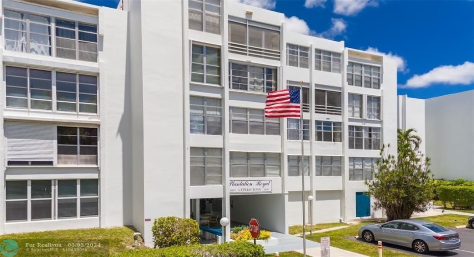 Flagpole entrance straight to elevator to 4th floor