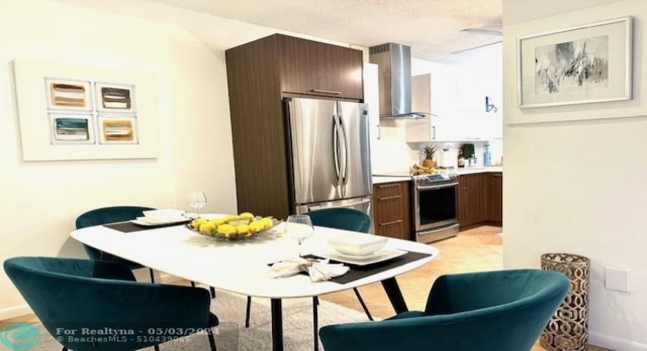 2 story Dining Room with skylight