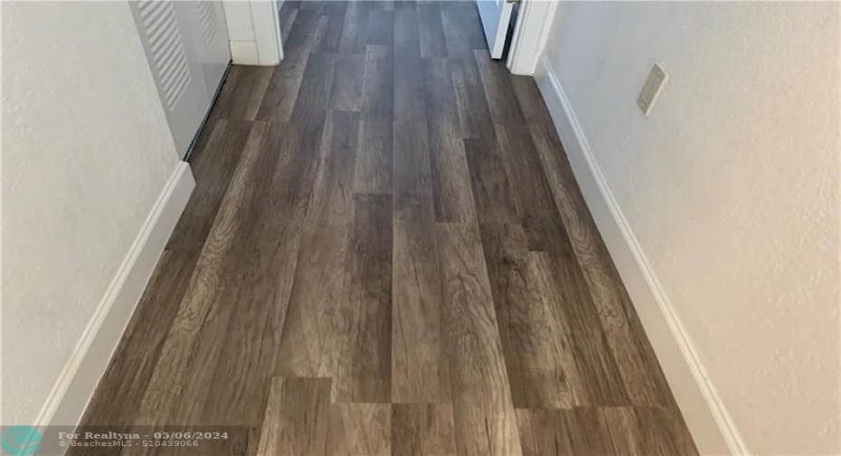 laminate flooring and some tile on second floor.