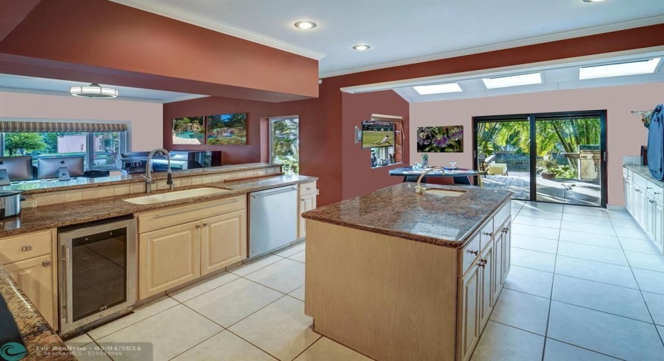 Huge gorgeous kitchen with granite counters and island
