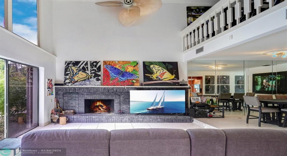 Family room with wood burning fireplace
