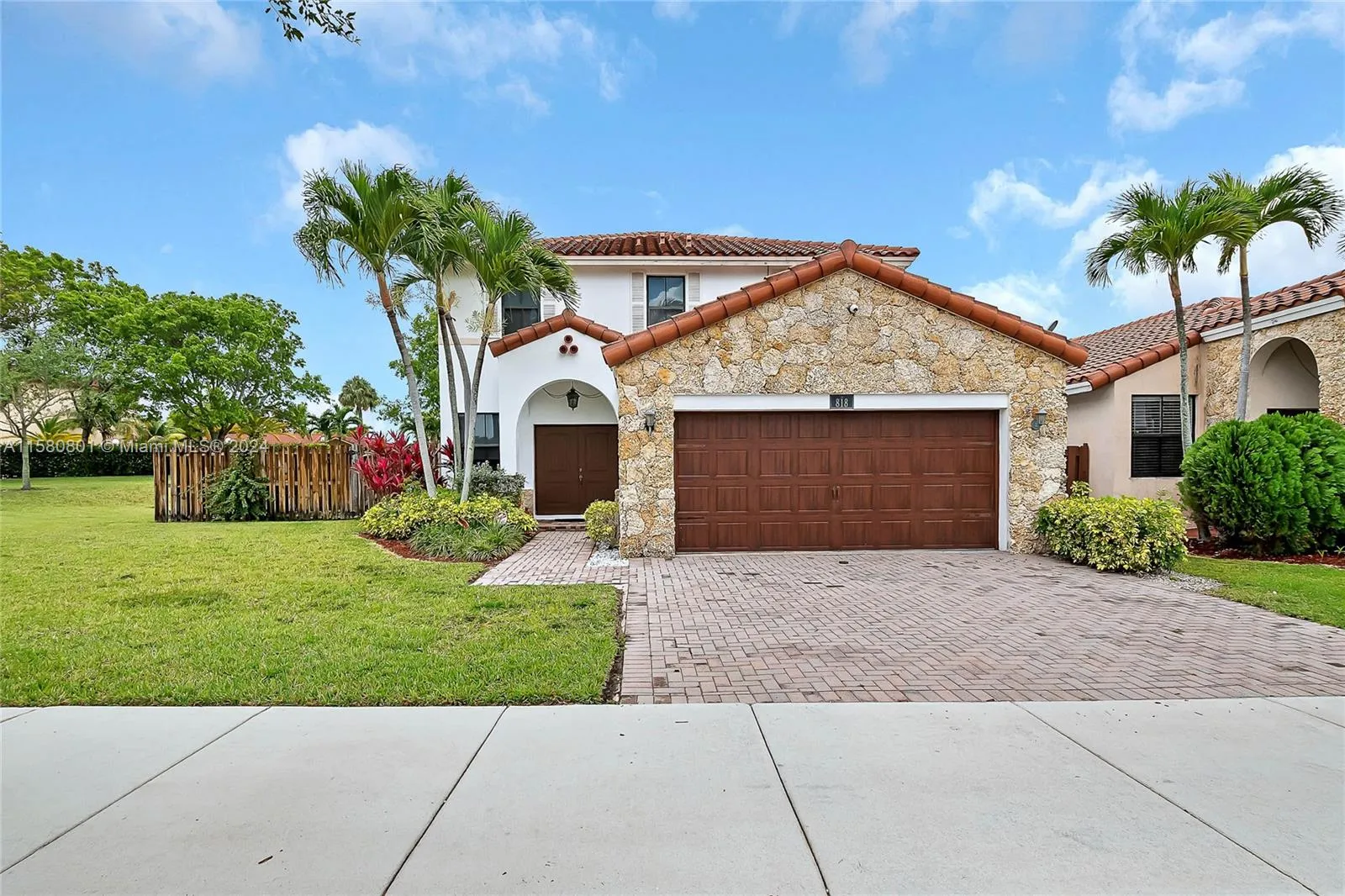 Stately corner home with two car garage