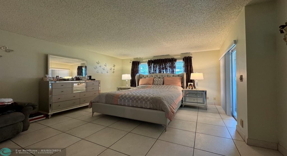BEDROOM WITH ENTRY TO SEPERATE BONUS ROOM